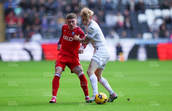 081125 - Swansea City v Ipswich Town, EFL Sky Bet Championship - Leif Davis of Ipswich and Melker Widell of Swansea City compete for the ball
