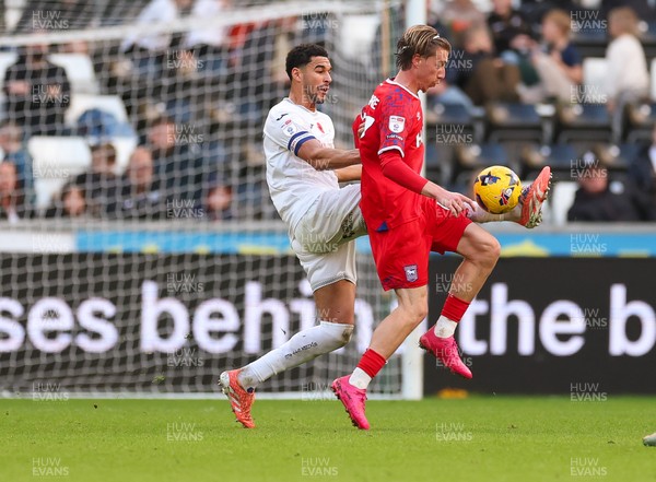 081125 - Swansea City v Ipswich Town, EFL Sky Bet Championship - Ben Cabango of Swansea City and Jack Clarke of Ipswich compete for the ball