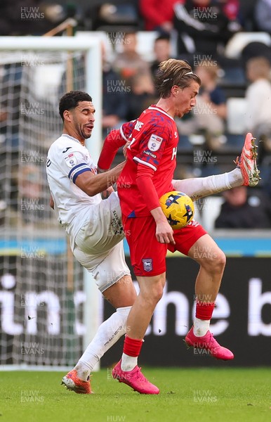 081125 - Swansea City v Ipswich Town, EFL Sky Bet Championship - Ben Cabango of Swansea City and Jack Clarke of Ipswich compete for the ball