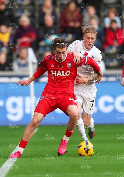 081125 - Swansea City v Ipswich Town, EFL Sky Bet Championship - Jack Clarke of Ipswich holds off Josh Key of Swansea City