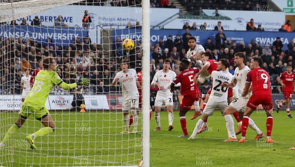 081125 - Swansea City v Ipswich Town, EFL Sky Bet Championship - Ipswich goalkeeper reacts to save fa header from Ben Cabango of Swansea City