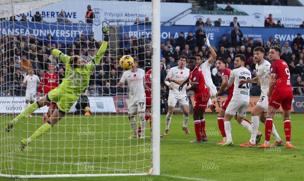 081125 - Swansea City v Ipswich Town, EFL Sky Bet Championship - Ipswich goalkeeper reacts to save fa header from Ben Cabango of Swansea City