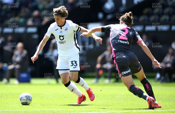 120720 - Swansea City v Leeds United - EFL SkyBet Championship - Conor Gallagher of Swansea City tries to go around Luke Ayling of Leeds United