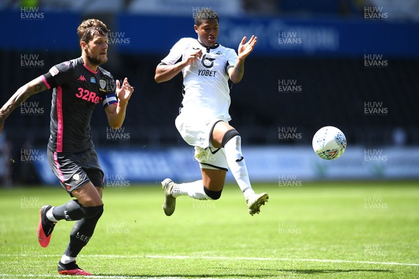 120720 - Swansea City v Leeds United - EFL SkyBet Championship - Rhian Brewster of Swansea City and Liam Cooper of Leeds United compete