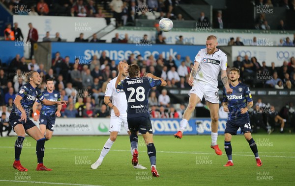 210818 - Swansea City v Leeds United, Sky Bet Championship - Oli McBurnie of Swansea City heads to score the second goal