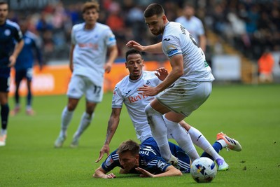 041025 - Swansea City v Leicester City - Sky Bet Championship - Luke Thomas of Leicester City is fouled by Ronald of Swansea City