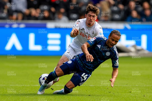 041025 - Swansea City v Leicester City - Sky Bet Championship - Josh Key of Swansea City battles for the ball with Bobby Decordova-Reid of Leicester City