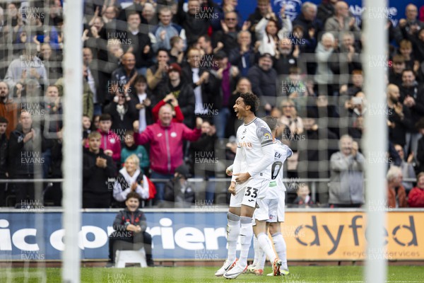 211023 - Swansea City v Leicester City - Sky Bet Championship - Bashir Humphrey of Swansea City celebrates his sides first goal scored by Matt Grimes