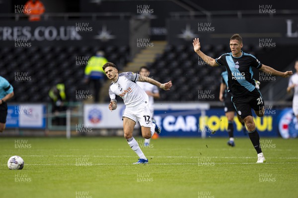 211023 - Swansea City v Leicester City - Sky Bet Championship - Jamie Paterson of Swansea City in action against Jannik Vestergaard of Leicester City