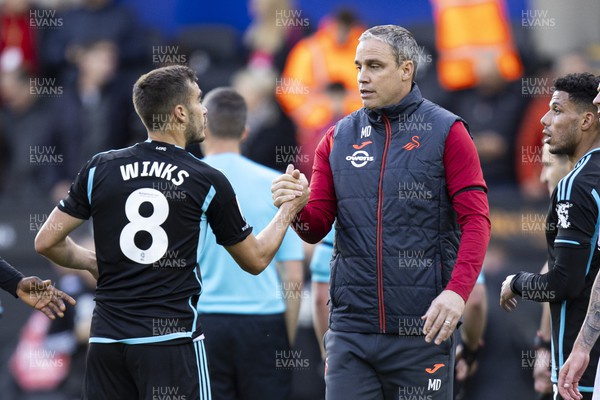 211023 - Swansea City v Leicester City - Sky Bet Championship - Swansea City manager Michael Duff with Harry Winks of Leicester City at full time