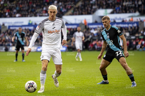 211023 - Swansea City v Leicester City - Sky Bet Championship - Jay Fulton of Swansea City in action against Kiernan Dewsbury-Hall of Leicester City