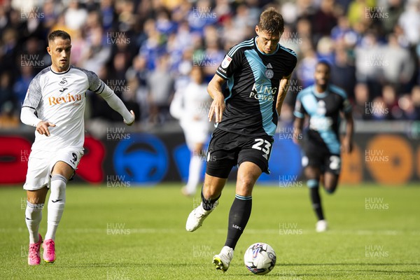 211023 - Swansea City v Leicester City - Sky Bet Championship - Jannik Vestergaard of Leicester City in action against Jerry Yates of Swansea City