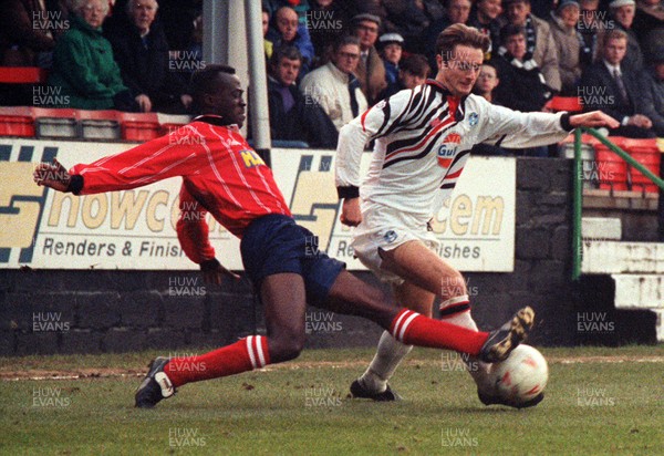 201193 - Swansea City v Leyton Orient - Jason Bowen of Swansea is tackled by Steve Okai of Orient