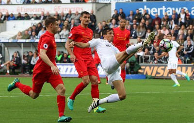 011016 - Swansea City v Liverpool, Premier League - Jack Cork of Swansea City stretches out at he looks to connect with the ball in front of the Liverpool goal