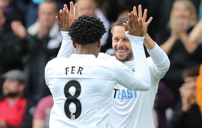 011016 - Swansea City v Liverpool, Premier League - Leroy Fer of Swansea City celebrates with Gylfi Sigurdsson of Swansea City after scoring his goal