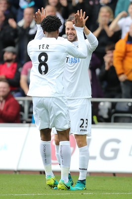 011016 - Swansea City v Liverpool, Premier League - Leroy Fer of Swansea City celebrates with Gylfi Sigurdsson of Swansea City after scoring his goal