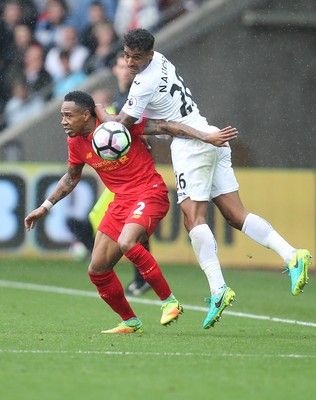 011016 - Swansea City v Liverpool, Premier League - Kyle Naughton of Swansea City gets above Nathaniel Clyne of Liverpool to win the ball