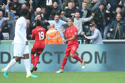 011016 - Swansea City v Liverpool, Premier League - Roberto Firmino of Liverpool celebrates after scoring goal