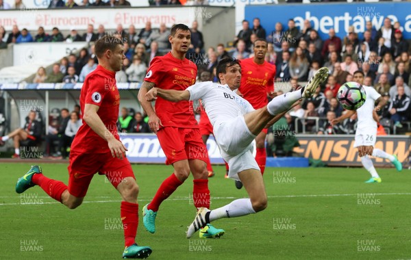 011016 - Swansea City v Liverpool, Premier League - Jack Cork of Swansea City stretches out at he looks to connect with the ball in front of the Liverpool goal