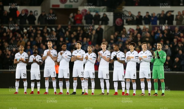 220118 - Swansea City v Liverpool - Premier League - Swansea player hold a minute silence for Cyrille Regis