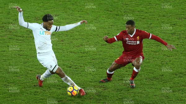 220118 - Swansea City v Liverpool - Premier League - Leroy Fer of Swansea City is challenged by Georginio Wijnaldum of Liverpool