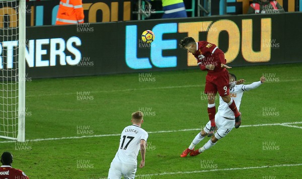 220118 - Swansea City v Liverpool - Premier League - Roberto Firmino of Liverpool header bounces off the post in the final seconds of the game