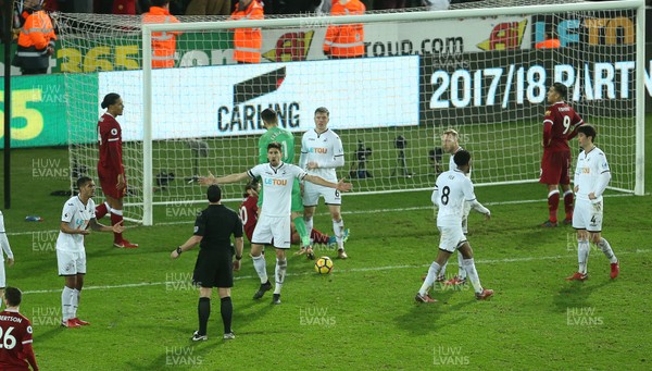 220118 - Swansea City v Liverpool - Premier League - Swansea player plead with the referee to call time