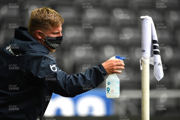 270620 - Swansea City v Luton - SkyBet Championship - Swansea City staff disinfect the pitch flags