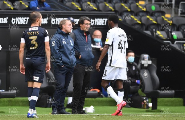 270620 - Swansea City v Luton - SkyBet Championship - Jordon Garrick of Swansea City walks past Swansea manager Steve Cooper after being shown a red card