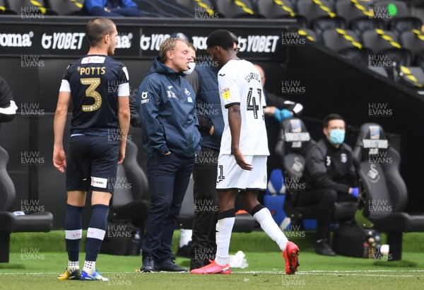 270620 - Swansea City v Luton - SkyBet Championship - Jordon Garrick of Swansea City walks past Swansea manager Steve Cooper after being shown a red card