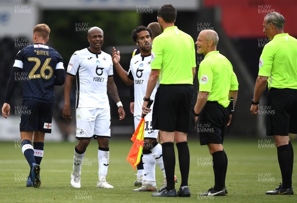 270620 - Swansea City v Luton - SkyBet Championship - Andre Ayew and Wayne Routledge of Swansea City talk to the officials at the end of the game