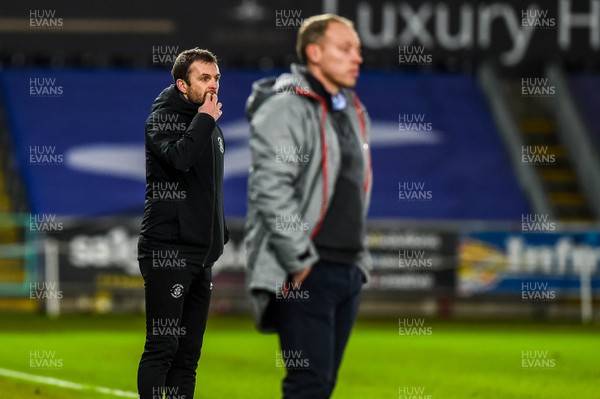 051220 - Swansea City v Luton Town - Sky Bet Championship -  Luton Town Manager, Nathan Jones ( left )  looks on 
