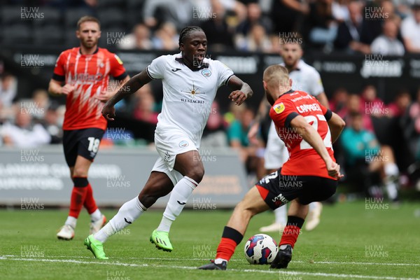 200822 - Swansea City v Luton Town - Sky Bet Championship - Michael Obafemi of Swansea City (c) in action 