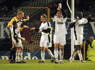 3-02-04 Swansea City v Macclesfield Town Swansea celebrate as they go through to the 4th round of the FA Cup  