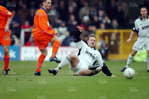 3-02-04 Swansea City v Macclesfield Town Swansea's  Kristian O'Leary tries to get past Stephen Brakcenridge  