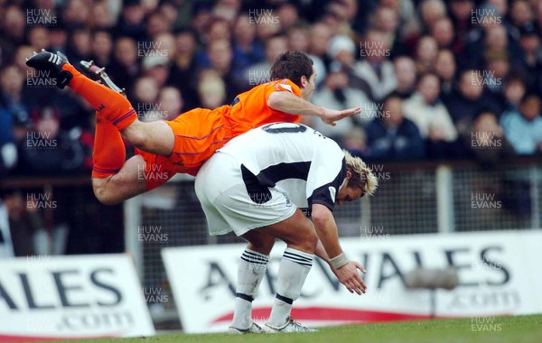 3-02-04 Swansea City v Macclesfield Town Swansea's Lee Trundle gives Michael Carr a lift  