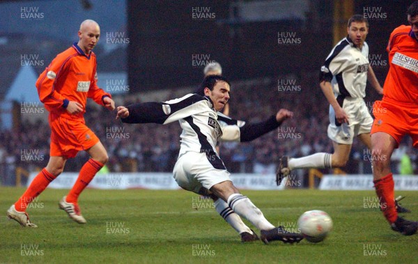 3-02-04 Swansea City v Macclesfield Town Swansea's Leon Britton gets close with shot on goal  