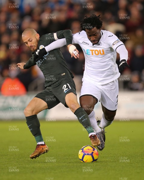 131217 - Swansea City v Manchester City, Premier League - Wilfried Bony of Swansea City takes on David Silva of Manchester City