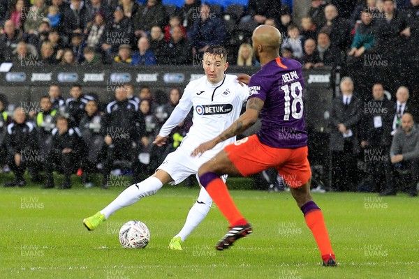 160319 - Swansea City v Manchester City, FA Cup Sixth Round - Bersant Celina of Swansea City (left) in action with  Fabian Delph of Manchester City