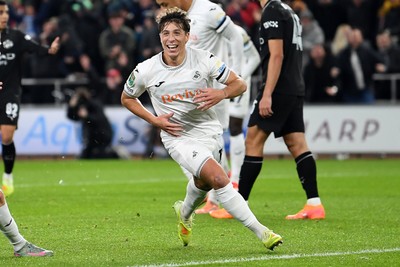 291025 - Swansea City v Manchester City - Carabao Cup Round 4 - Goncalo Franco of Swansea City celebrates scoring a goal with team mates