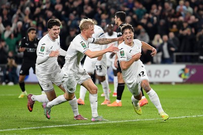 291025 - Swansea City v Manchester City - Carabao Cup Round 4 - Goncalo Franco of Swansea City celebrates scoring a goal with team mates