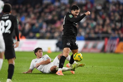 291025 - Swansea City v Manchester City - Carabao Cup Round 4 - Rayan Cherki of Manchester City is challenged by Goncalo Franco of Swansea City