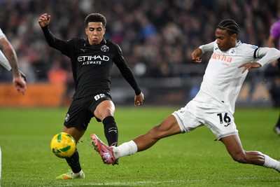291025 - Swansea City v Manchester City - Carabao Cup Round 4 - Ishe Samuels-Smith of Swansea City is challenged by Rico Lewis of Manchester City