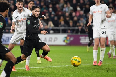 291025 - Swansea City v Manchester City - Carabao Cup Round 4 - Rayan Cherki of Manchester City has a shot on goal