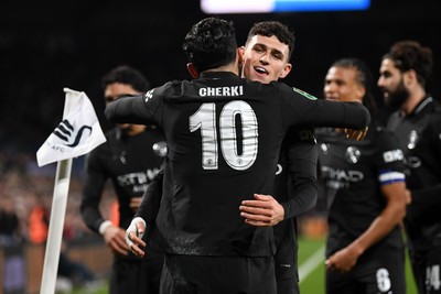 291025 - Swansea City v Manchester City - Carabao Cup Round 4 - Phil Foden of Manchester City celebrates with Rayan Cherki of Manchester City after Omar Marmoush of Manchester City scored a goal