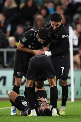 291025 - Swansea City v Manchester City - Carabao Cup Round 4 - Rayan Cherki of Manchester City celebrates scoring a goal with team mates
