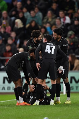291025 - Swansea City v Manchester City - Carabao Cup Round 4 - Rayan Cherki of Manchester City celebrates scoring a goal with team mates