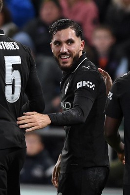 291025 - Swansea City v Manchester City - Carabao Cup Round 4 - Rayan Cherki of Manchester City celebrates scoring a goal with team mates
