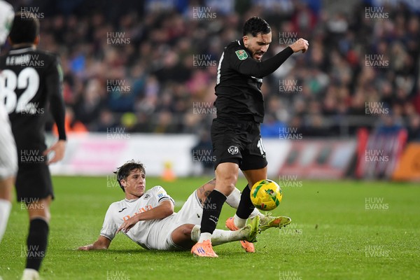 291025 - Swansea City v Manchester City - Carabao Cup Round 4 - Rayan Cherki of Manchester City is challenged by Goncalo Franco of Swansea City