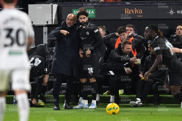 291025 - Swansea City v Manchester City - Carabao Cup Round 4 - Pep Guardiola, Manchester City Manager with Josko Gvardiol of Manchester City